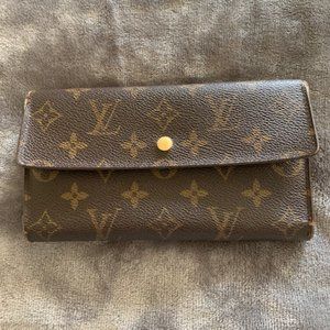 Louis Vuitton 7 inch x 4 1/4 inch brown wallet